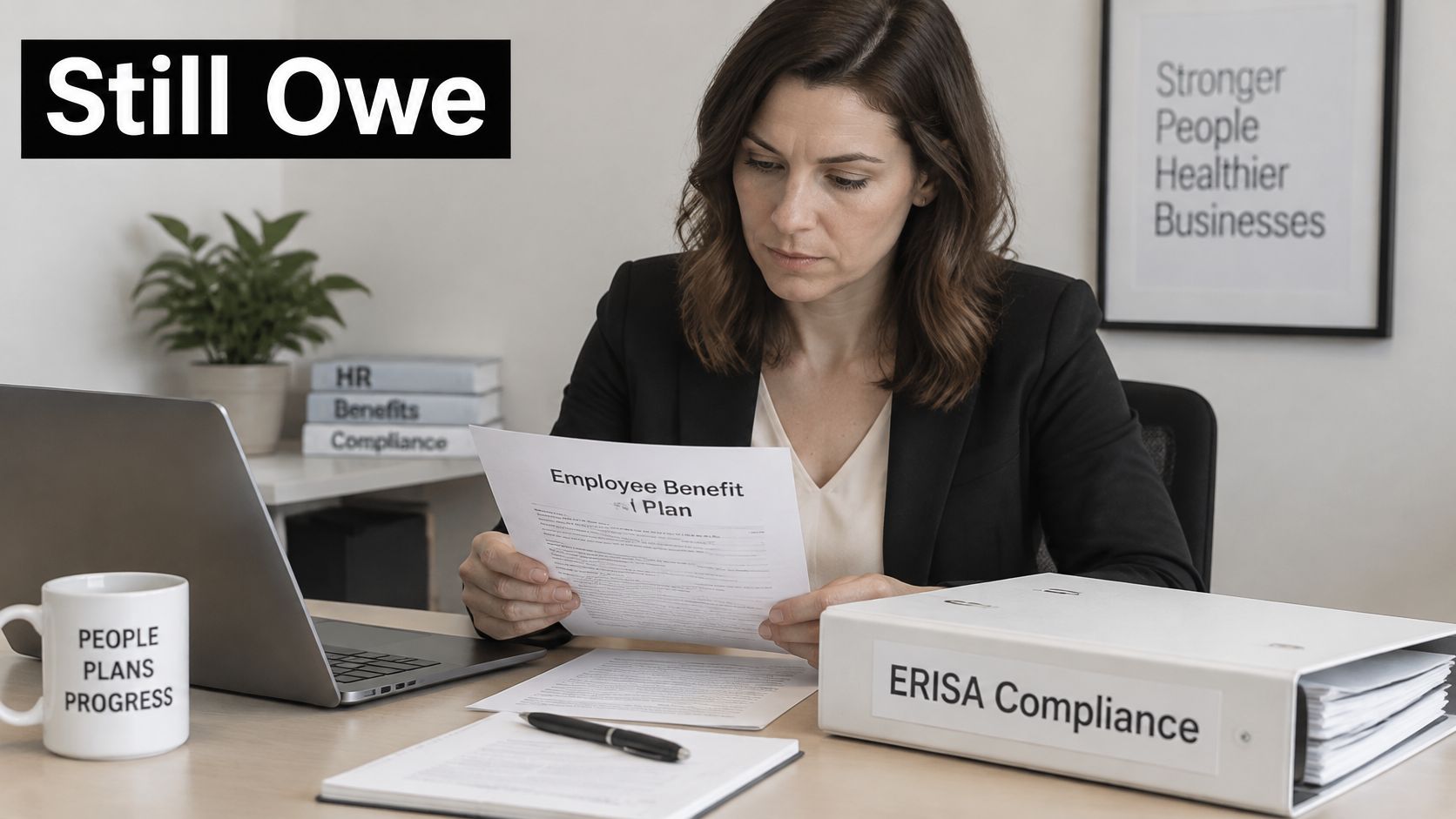 A professional woman in a suit reviews an employee benefit plan document at her organized office desk.